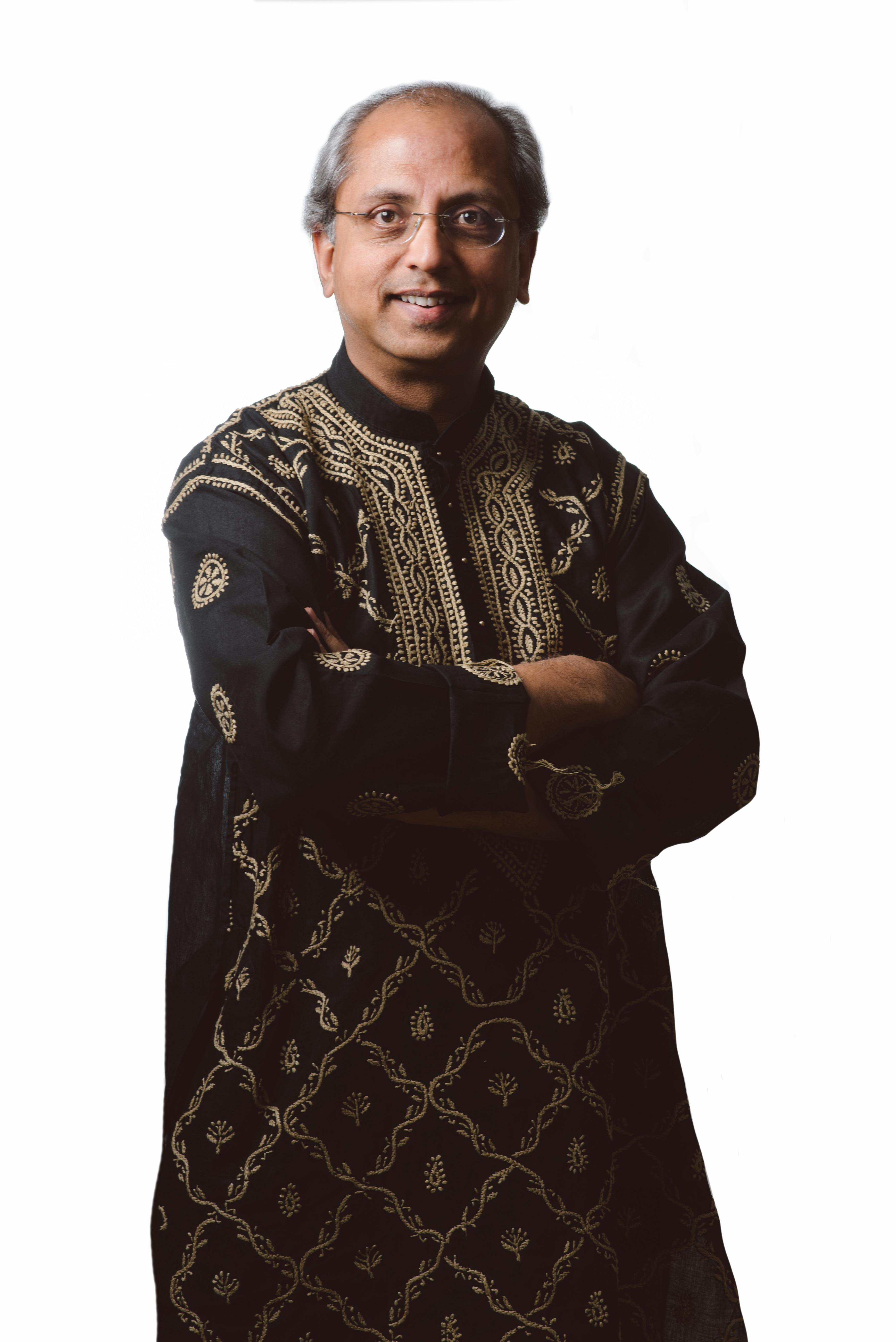 Yogesh Samsi formal portrait in dark embroidered kurta